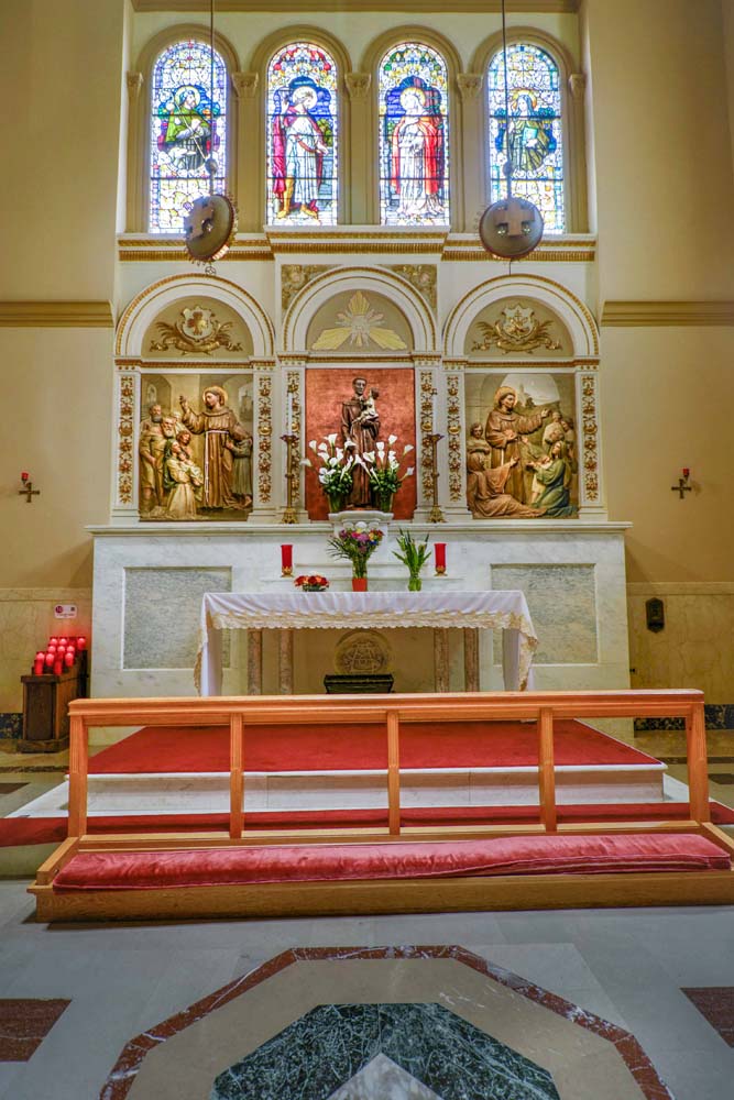 Saint Joseph Chapel altar, statue, and two paintings