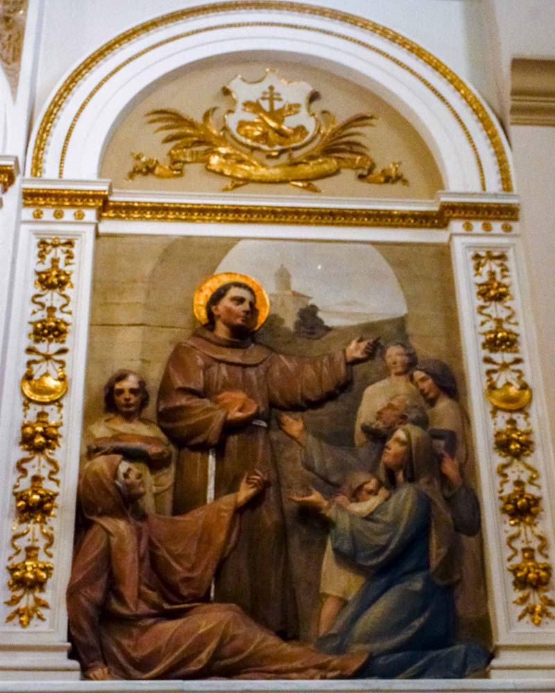 Close-up of painting of Saint Joseph leading his family to flee to Egypt to escape Herod
