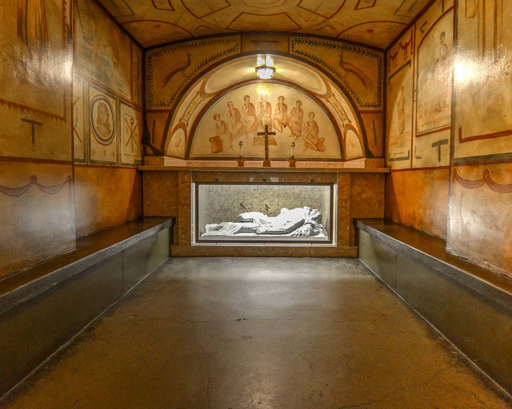 Chapel of Saint Sebastian, with recumbent statue pierced with arrows