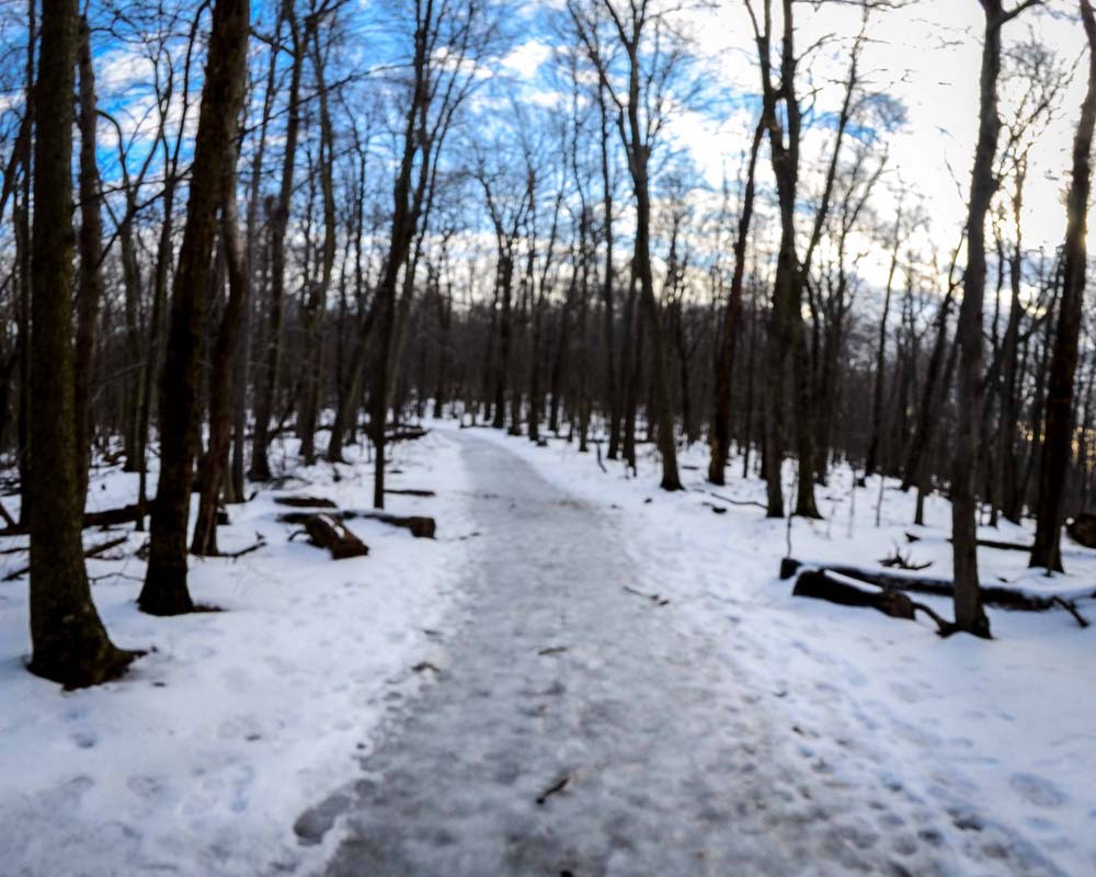 Two men sitting on a rock outcropping to the south of Black Rock
