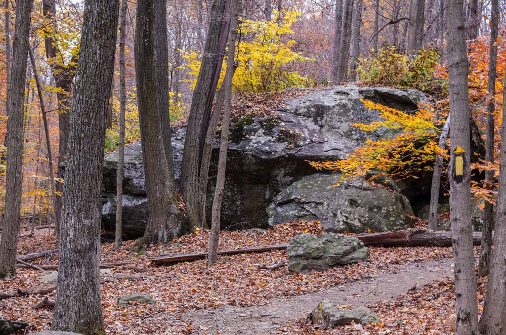 The side trail that is marked with yellow blazes and goes around big rocks