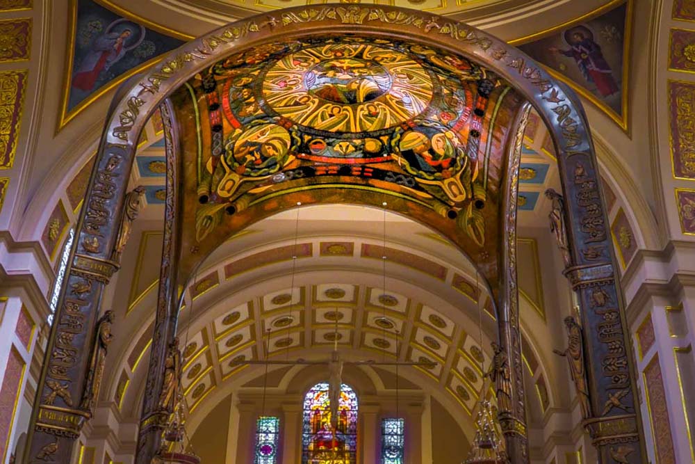 View of the Baldechin, looking up into its ceiling and showing attractive paining of spiritual themes